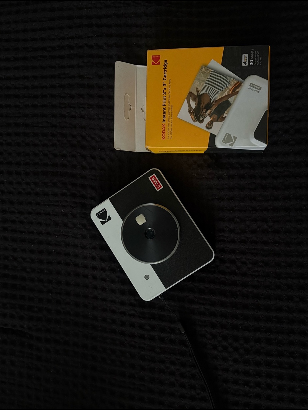 Kodak Instant Camera in Black and White with Yellow Film Box